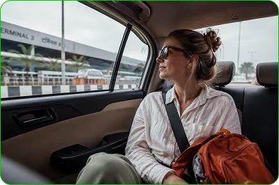 Traveller riding from the airport by car